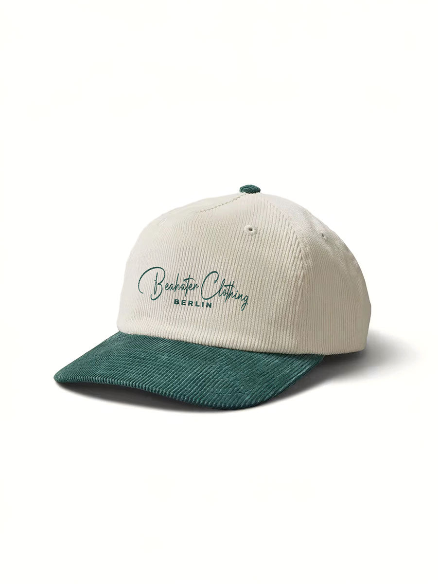 Grüne Cord Cap Baseball Edition – hochwertige 2D-Stickerei, strukturierter Cordstoff & markantes Label-Tag für einen einzigartigen Look.