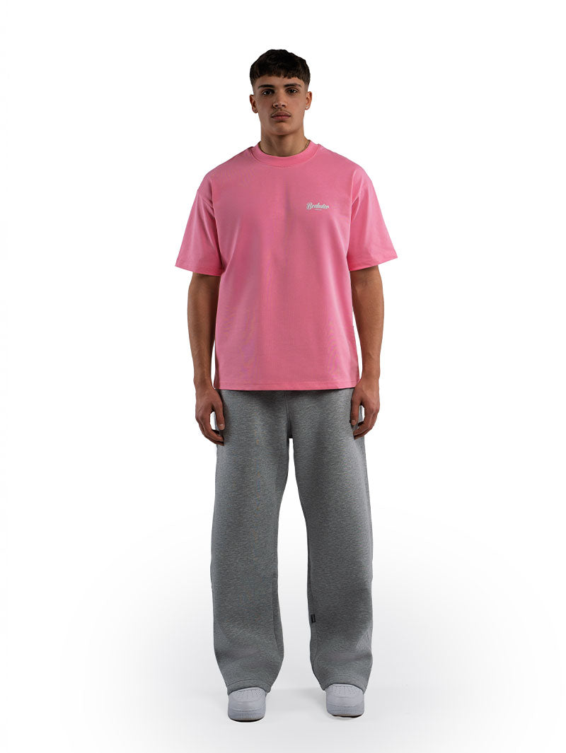 Trendiges Candy Pink Oversized T-Shirt von Essential Puff. Lässiges Statement-Piece für moderne Streetwear-Looks. Jetzt angesagte Oversize-Shirts in zartem Rosa online shoppen!