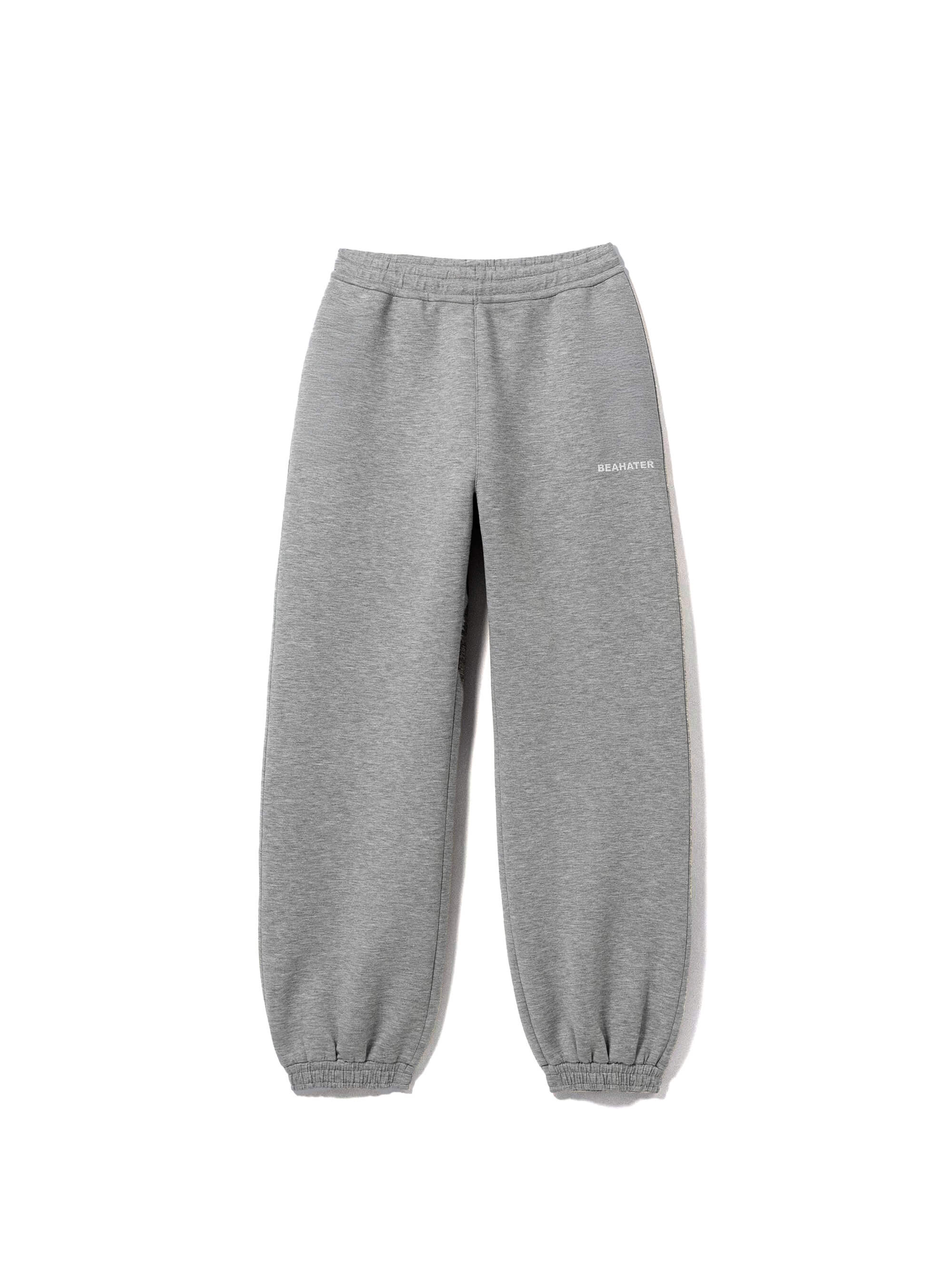 Baggy Jogger Sweatpants in Ash Grey für Herren und Damen, Frontansicht auf weißem Hintergrund, hochwertiger French Terry Stoff mit elastischem Bund und Streetwear Fit