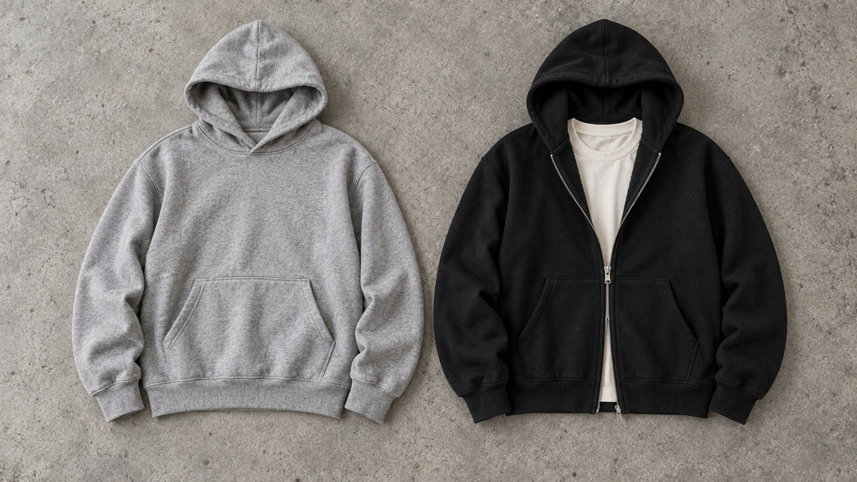Editorial-Illustration: grauer Pullover-Hoodie neben schwarzem Zip-Hoodie mit T-Shirt.